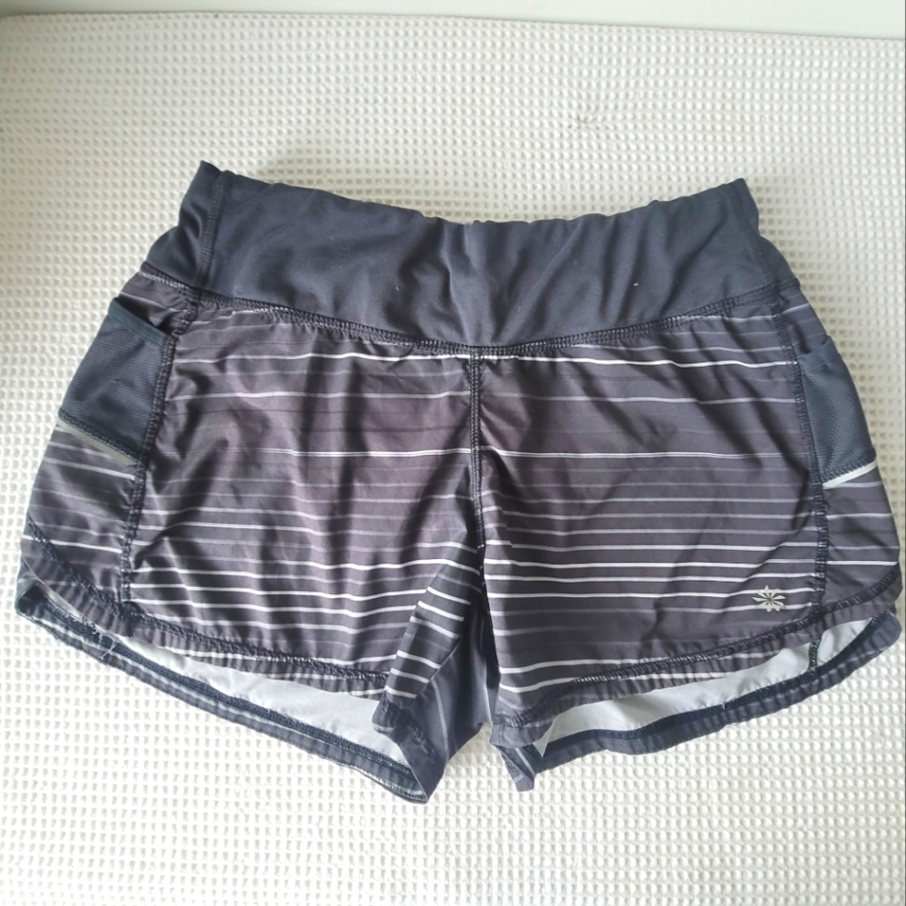 Athleta lined Striped running shorts Size M